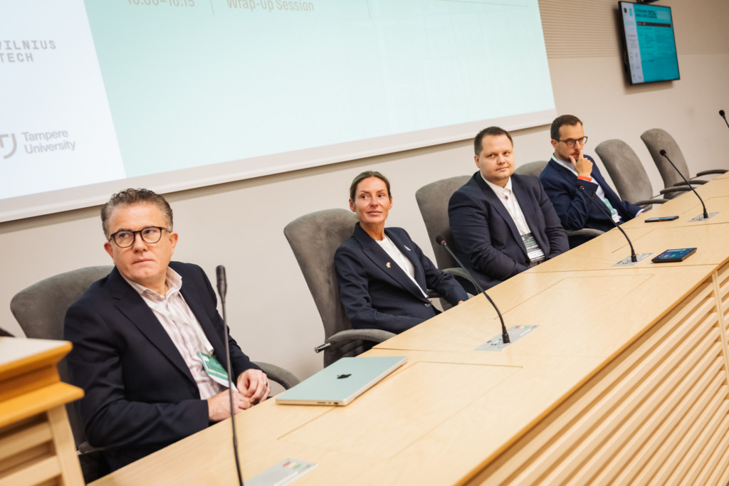 Dr Virgilijus Dirma. Linas Petkevičius. Tadas Stankevičius. and Simona &Scaron;imulytė take part in a panel discussion at the SustAInLivWork Annual Summit 2026.
